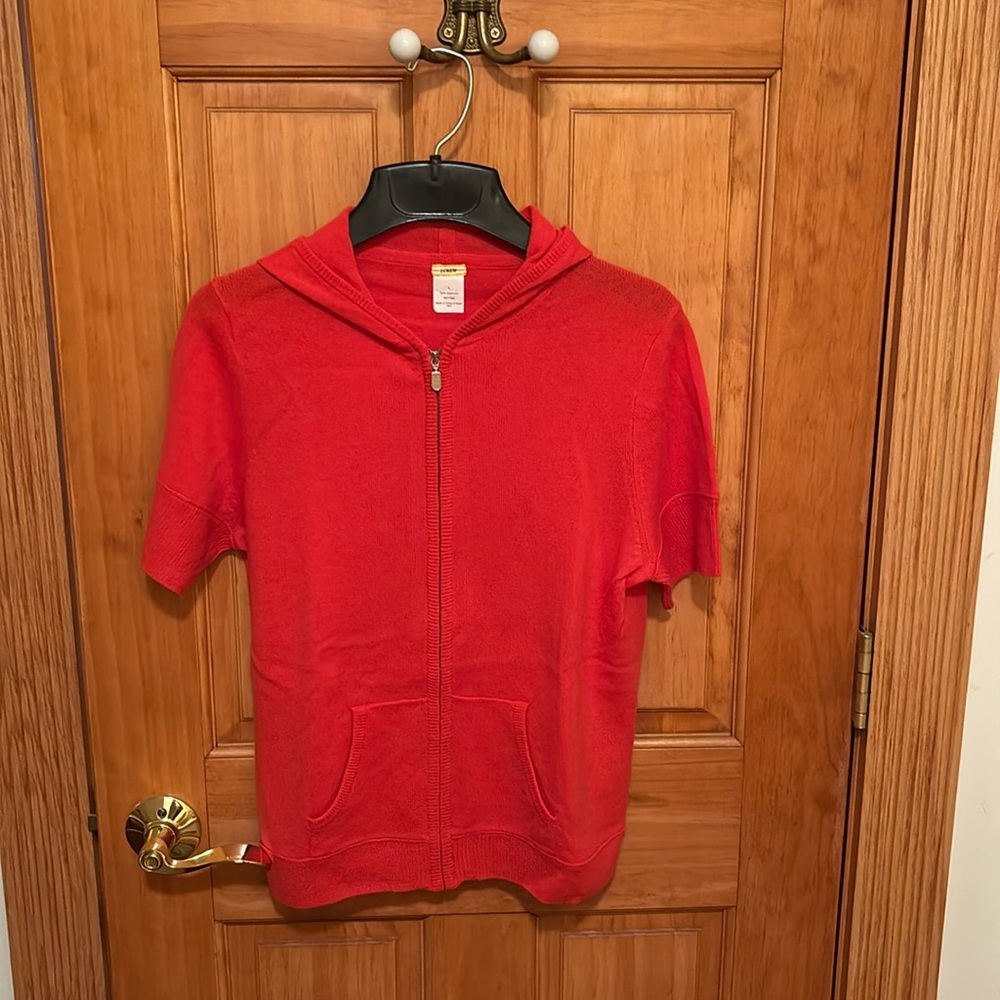 Bright orange 100% cashmere sweater by J crew in size L.